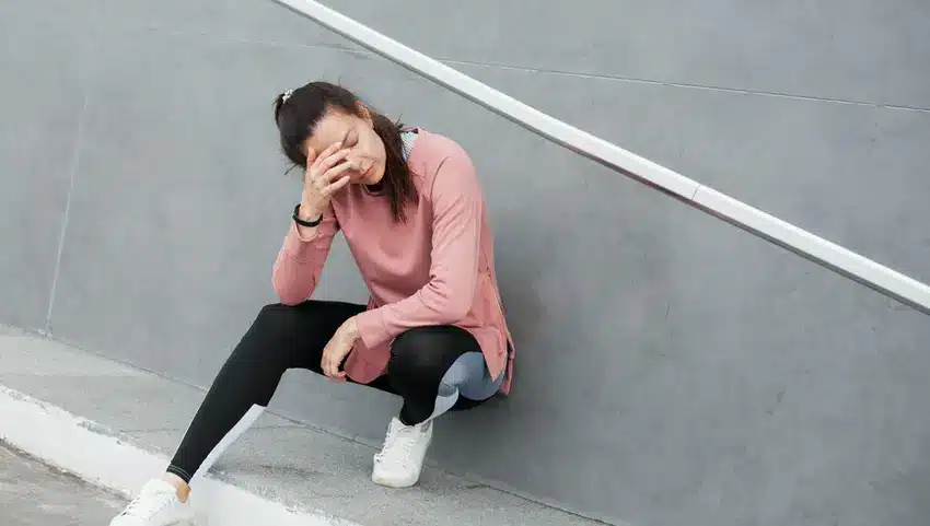 a woman sitting on a step