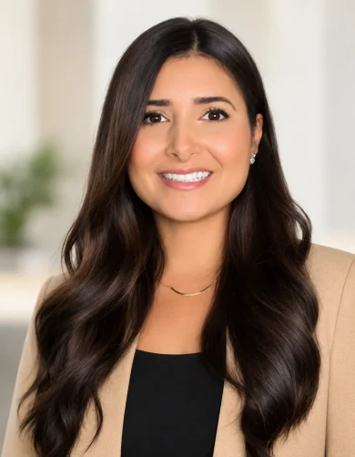 Professional woman smiling, representing women's health and wellness services.