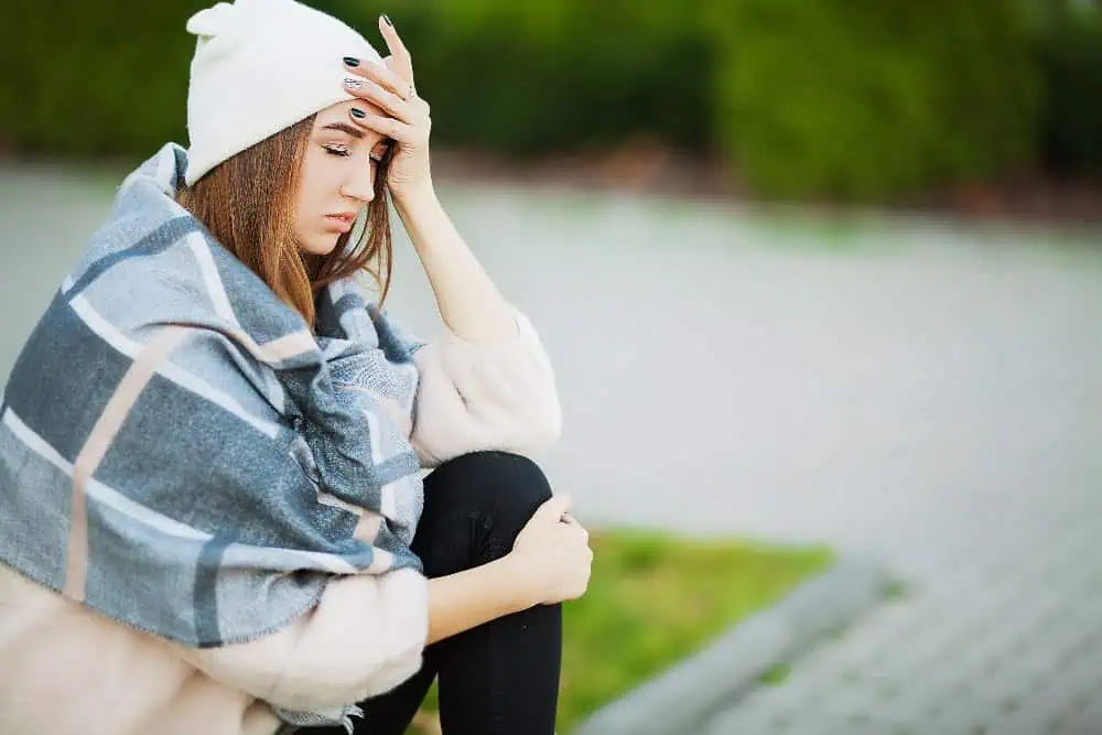 woman looking distraught