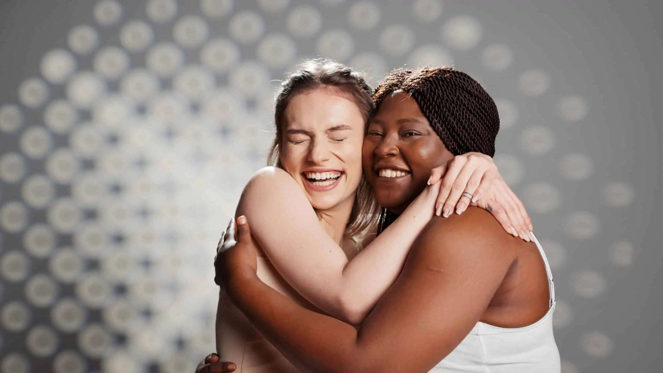 Diverse group of young women smiling together at Sol Women's Treatment