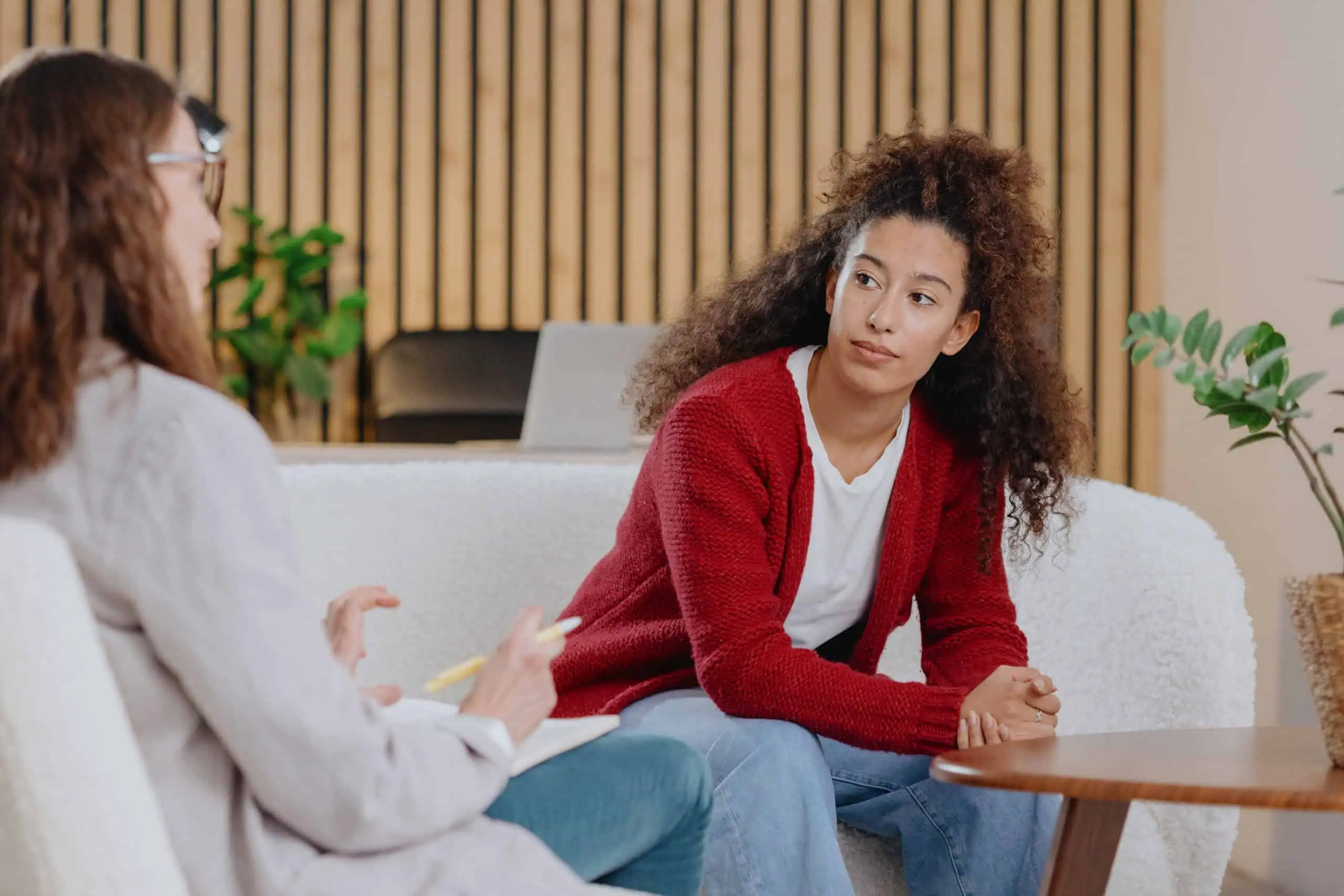 Young woman receiving support at a therapy appointment at Sol Women's Treatment
