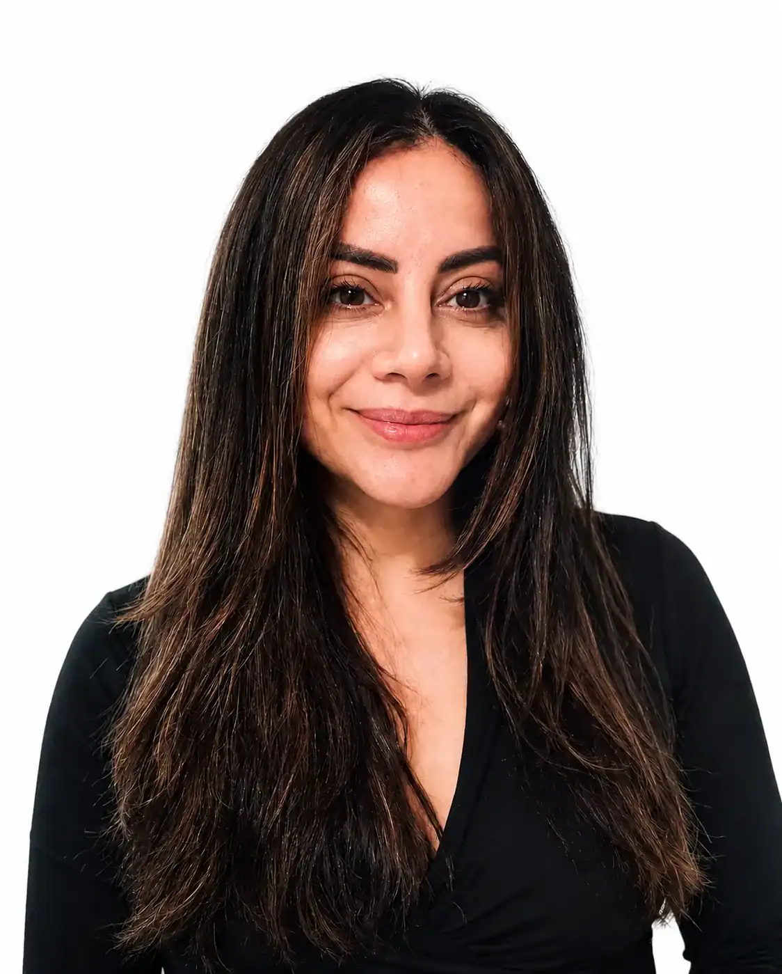 Professional woman with long dark hair smiling for the camera.