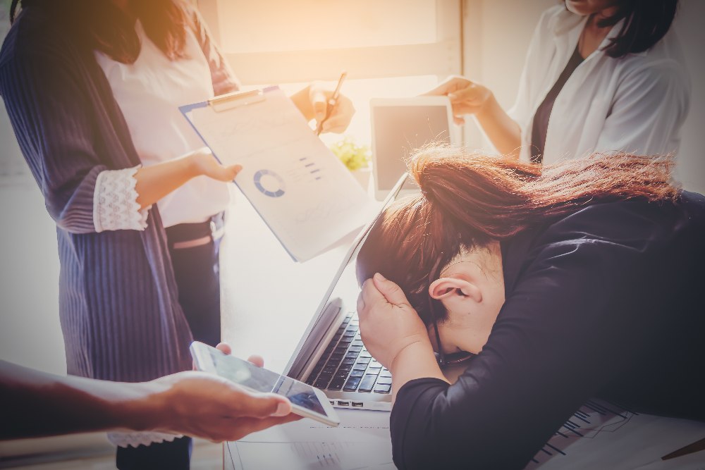 Stressed person With Papers And Charts